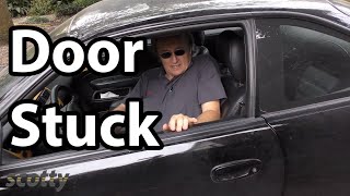 How to Fix a Stuck Car Door that Wont Open [upl. by Hgielyk]