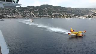 Water Bombers load up next to cruise liner [upl. by Aivirt]