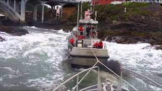 Coast Guard Station Depoe Bay lifeboat tows another lifeboat through quotThe Holequot [upl. by Janek]