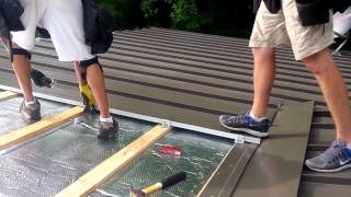 Standing seam roof installation [upl. by Ynos]