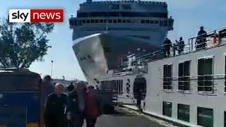 Cruise ship crashes into dock and tourist boat in Venice [upl. by Afira809]