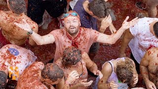 La Tomatina  Festival Discoveries  World Nomads [upl. by Florina]