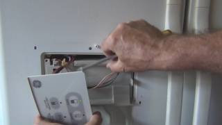 How to repair a frozen GE Refrigerator water dispenser [upl. by Pantia]