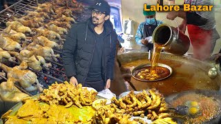 LAHORI STREET FOOD IN PAKISTAN  Motay Ke Channy Khalifa Sajji amp Deep Fried Chicken [upl. by Clair377]