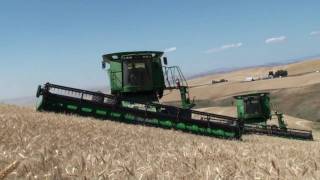 John Deere STS combines equipped with Hillco Hillside Leveling Systems [upl. by Barta]