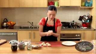 Poh Ling Yeow cooking Malaysian Nyonya Chicken Curry and Roti Canai [upl. by Nylia]